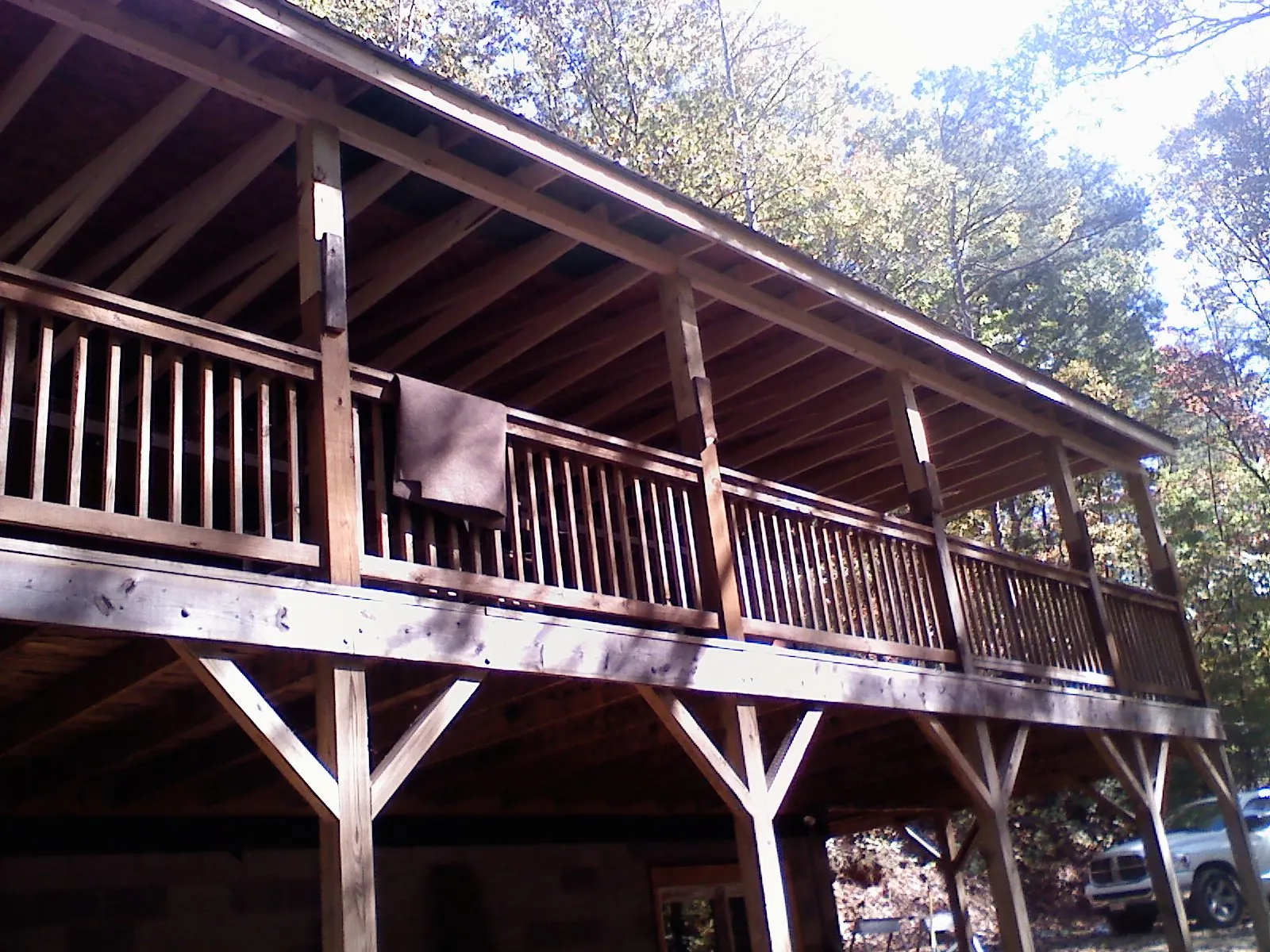 Timber framing under a new elevated porch and deck — Roof Leak Repair in Central City by Roofing Brothers